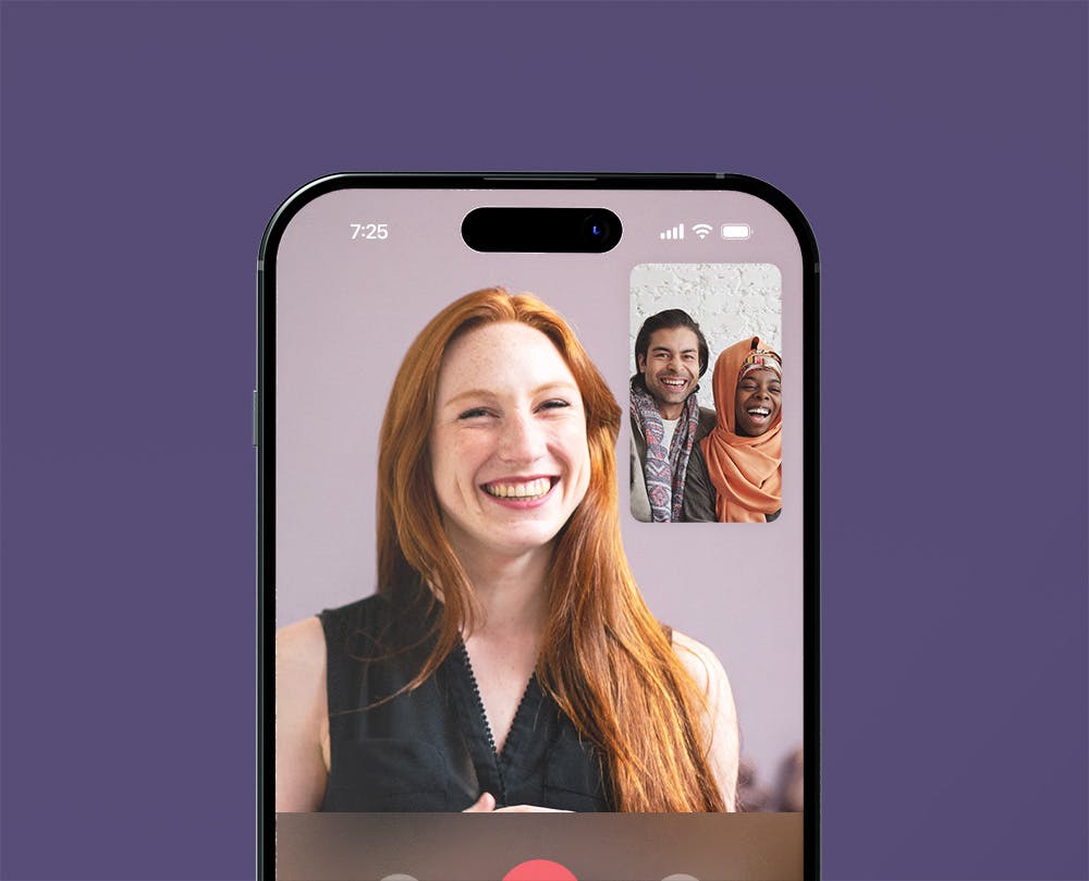 a smartphone showing a video call between a genetic counsellor and a smiling couple
