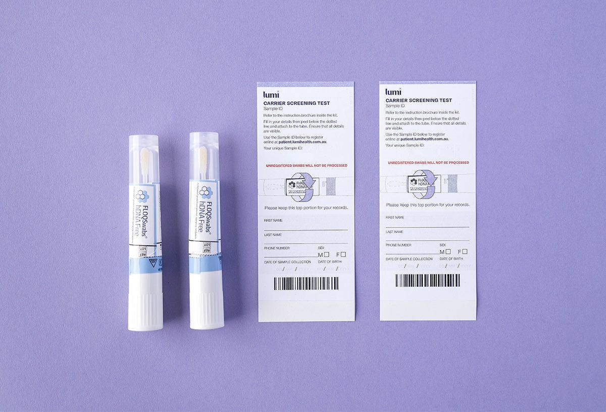 A photo of the 2 swabs and Sample ID stickers included in a Lumi Health Extended Carrier Screening test