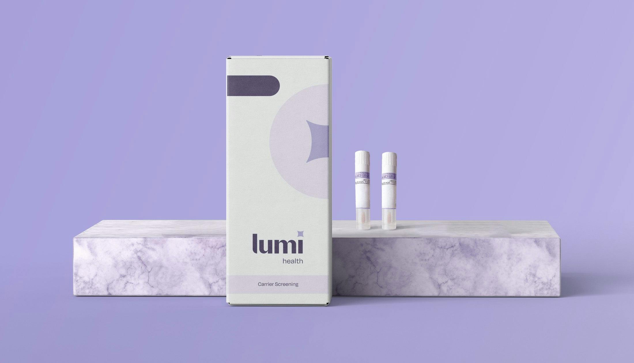 a front-on photo of a Lumi Health Extended Carrier Screening kit with two swabs